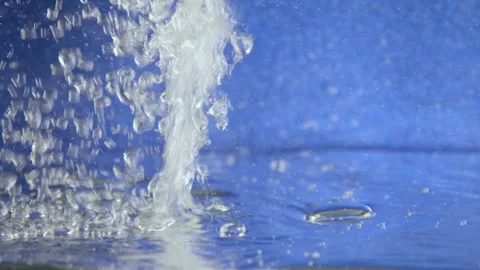 Water bubbles on shiny blue background Stock Footage 254727364