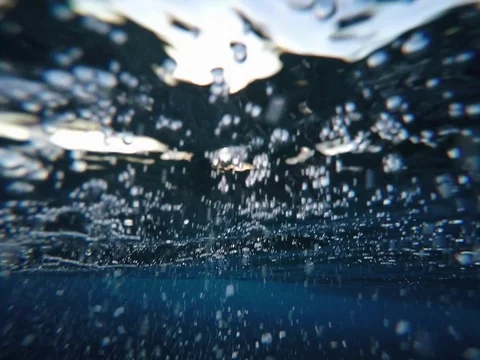 Water bubbles from surface of surf break Stock Footage 80153671