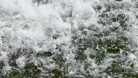 Water Bubbling and Flowing, Creating White Foam Video stock 273991624