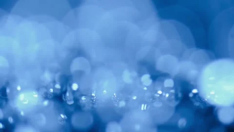 Water bubbling or boiling in clear glass. Video stock 255090790