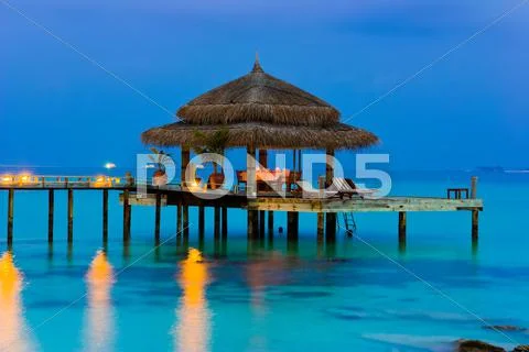 Water cafe at evening Stock Photos