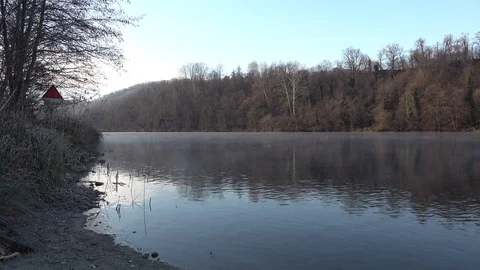 WATER CALMS WHICH GO IN THE RIVER TO THE MORNING SOON IN WINTER Stock Footage 101059733