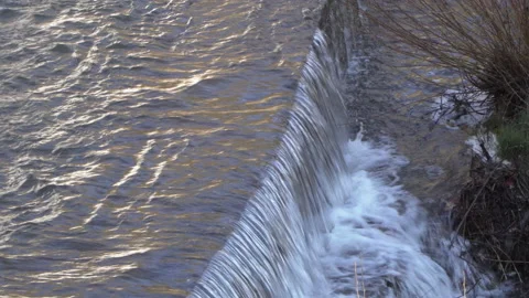 Water cascade streaming down a lasher Stock Footage 162420209