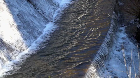 Water cascade streaming down a lasher, slow motion Stock Footage 233179507