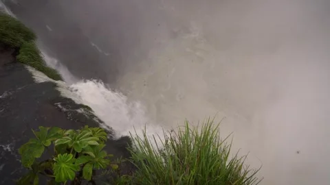Water Cascading into Devil's Throat Amid Mist at Iguazu Falls Stock-Footage 341555357