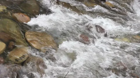 Water Cascading Down Rocks in a Mountain Stream Stock-Footage 50743604