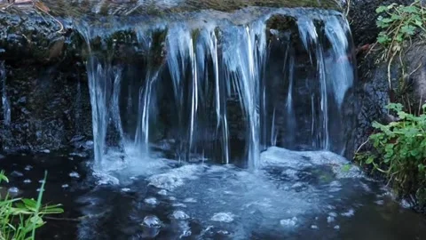 Water Cascading Down Rocks, UK Stock Footage 221272972