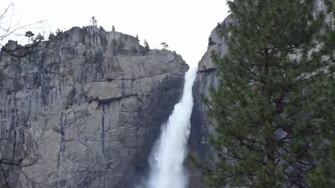 Water cascading down Upper Yosemite Falls during Spring 2023 snowmelt Stock Footage 241194083