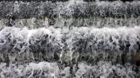 Water cascading down a weir Video stock 32395717