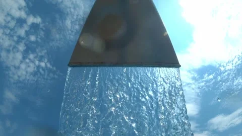 Water cascading from hydromassage waterfall spout at outdoor water park aga.. Stock Footage 342046073