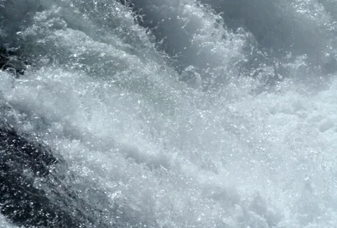 Water cascading over rocks Stock Footage 86885211