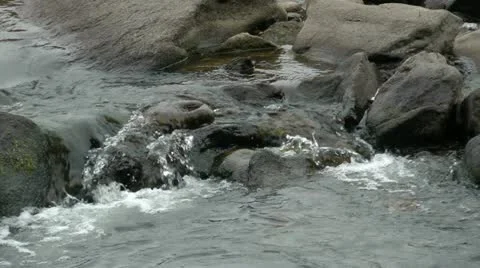 Water cascading over rocks - hd - 1920x1080 Stock Footage 11060092