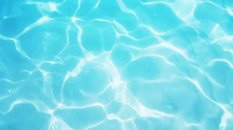 Water caustics. Blue water with shining caustics in slow motion. Stock Footage 67109948