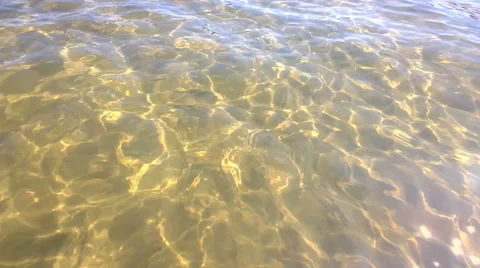 Water caustics on deep sandy bottom perspective Stock Footage 41497265