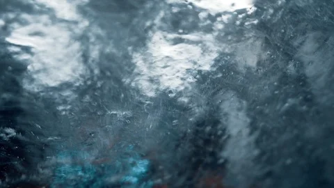 Water close-up on a front car window. Rain on a glass Stock Footage 123211306