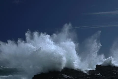 Water cloud of a splashing wave Stock Photos