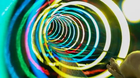 Water colored attraction slide inside the colorful pipe Stock Photos