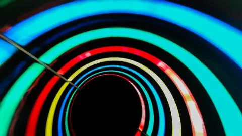 Water colored attraction slide inside the colorful pipe Stock Photos