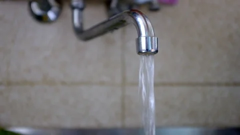 Water comes down from the tap Stock Footage 78864903