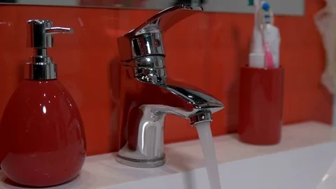 The water comes from the tap Stock Footage 73230009
