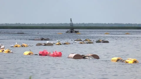 Water conservancy, buoys floating on the surface of a river or lake Stock-Footage 136423395