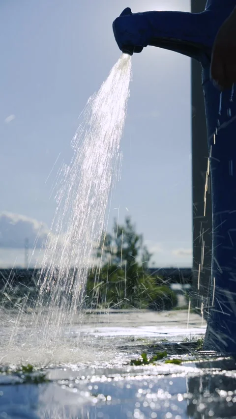 Water Conservation and hydration concept, hand catching fresh water stream 库存影片 336186000