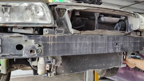 The Water Cooling System of an Old Car is Being Repaired at the Service Stock Footage 304640431