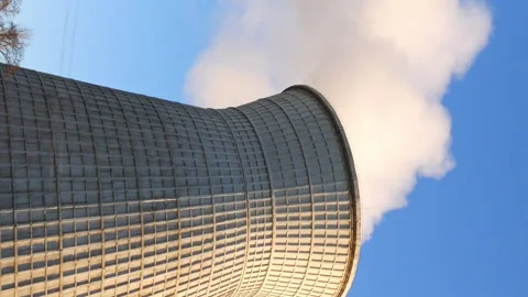 Water cooling tower stack smoke over blue sky Stock Footage 91164039