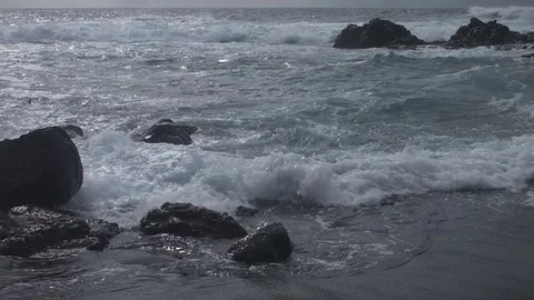 Water Covering Small and Large Rocks Stock Footage 75922377