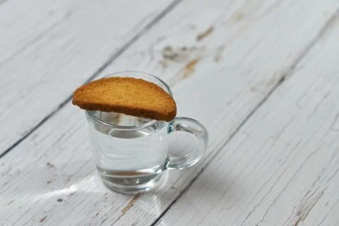 Water, crackers and drying on the background of boards. Stock Photos