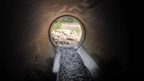 Water culvert looking out. Video stock 121517552