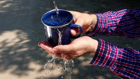 Water cup hands 25948 Stock Footage 111138052