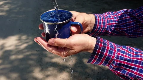 Water cup hands 25950 Stock Footage 111138064