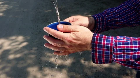 Water cup hands Stock Footage 111138075