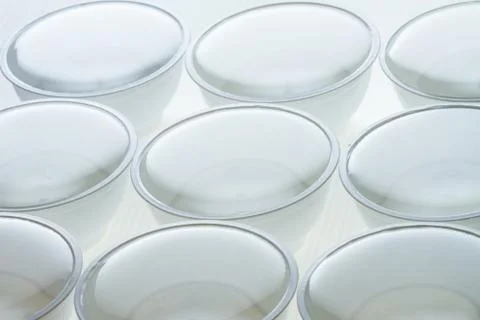 Water on cups isolated Stock Photos