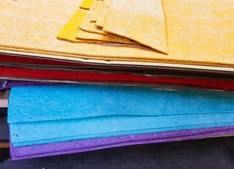 Water cutting on a cnc machine of multi-colored decorative materials close-up Stock Photos