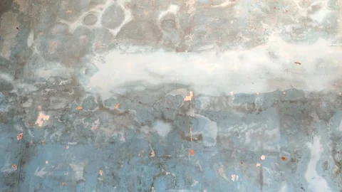 Water damage and damp spots on blue wall. Home maintenance concept Stock Footage 327513331