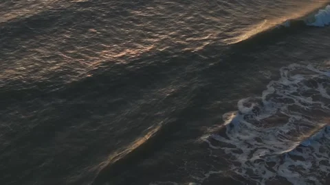 The water is dark and the waves are small Stock Footage 298250697