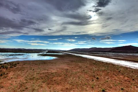 Water in desert Stock Photos