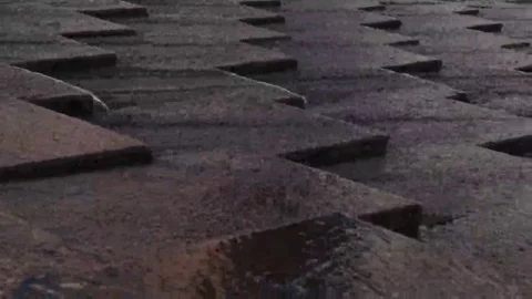 Water display riplling over nice design stones  Stock Footage 69110946