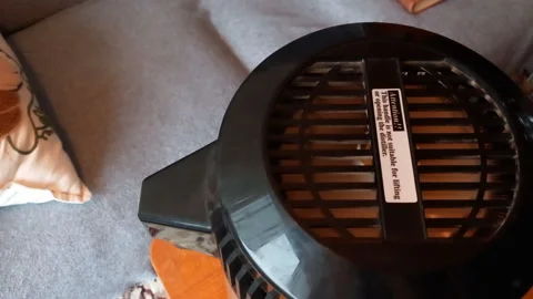Water Distiller Startup- Button Click, Fan Whir, and Heater Hum -- Top-Down View Stock Footage 338176132