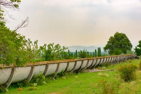 The water ditch goes through the fields Stock Photos