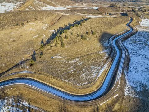 Water diversion ditch at Colorado foothills - aerial view Stock Photos