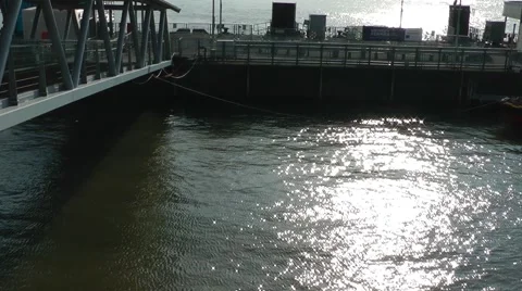 Water at docks with sparkling sun Stock Footage 40691254