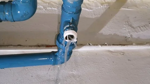 Water does not stop when the 'T' connector at the 1-inch supply water pipe Stock Footage 120002674