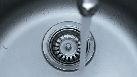 Water down a sink drain Stock-Footage 86897803