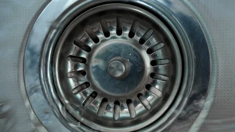 Water down a sink drain Stock Footage 88138042