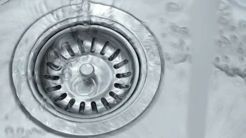 Water down a sink drain. Stock Footage