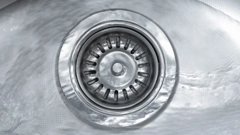 Water down a sink drain. Stock Footage 122586117