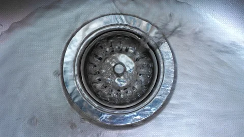Water down a sink drain. Video stock 123053595